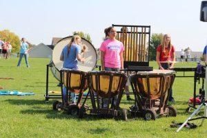 The Marion High School Scarlet Spectrum's Pit practicing outside the school