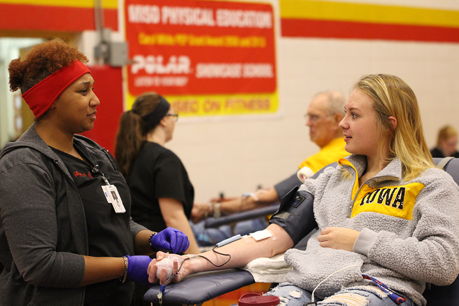 Cappra Svoboda, 18, donates blood during the high school blood drive on Wed., Nov. 8th. 