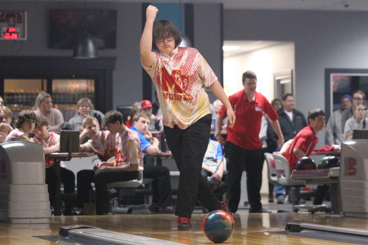 Tyler Winterboer, sophomore, releases his bowling ball at a home meet. 