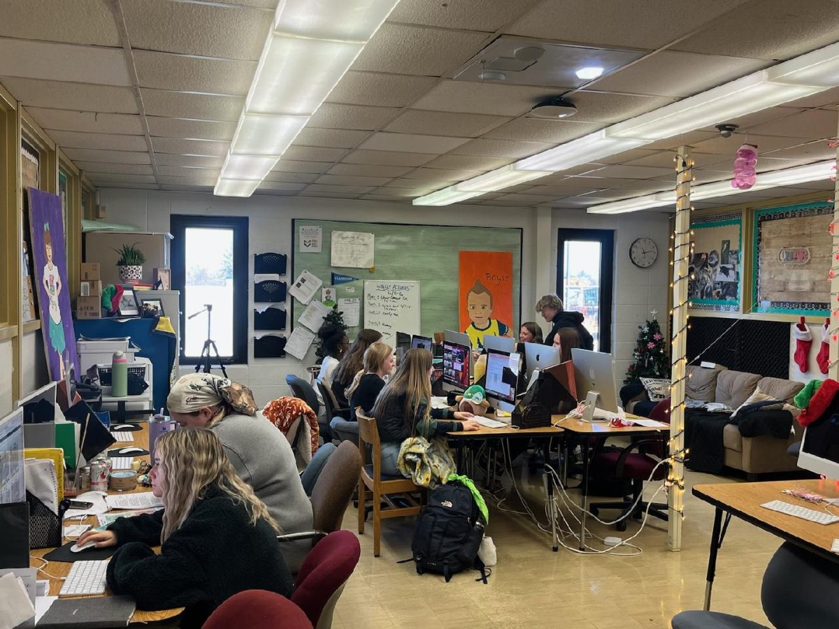 Various journalism students work diligently during their third block class on different tasks to create the yearbook, newspaper, and broadcast.