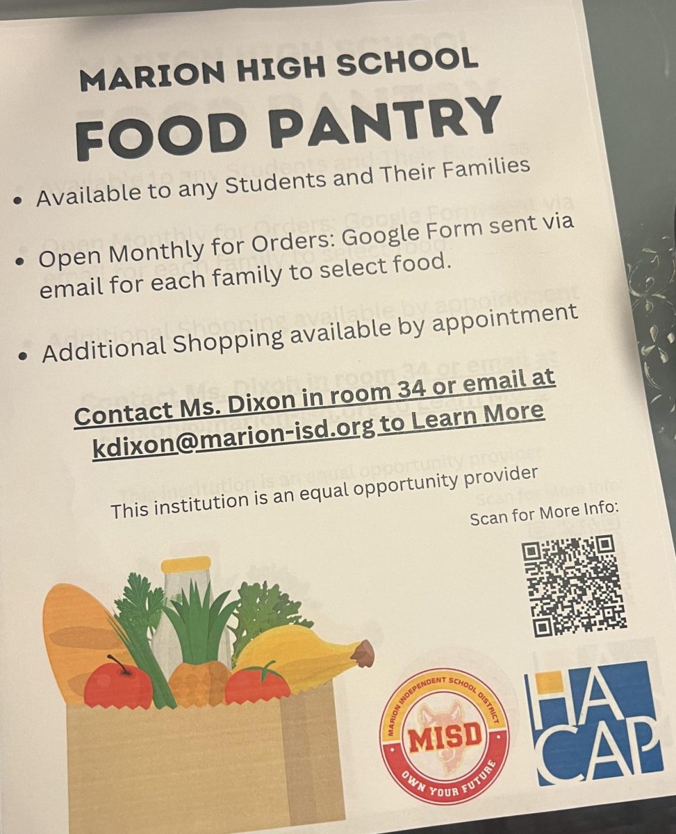 One of the many flyers hung around the district buildings to provide information about the high school food pantry. 