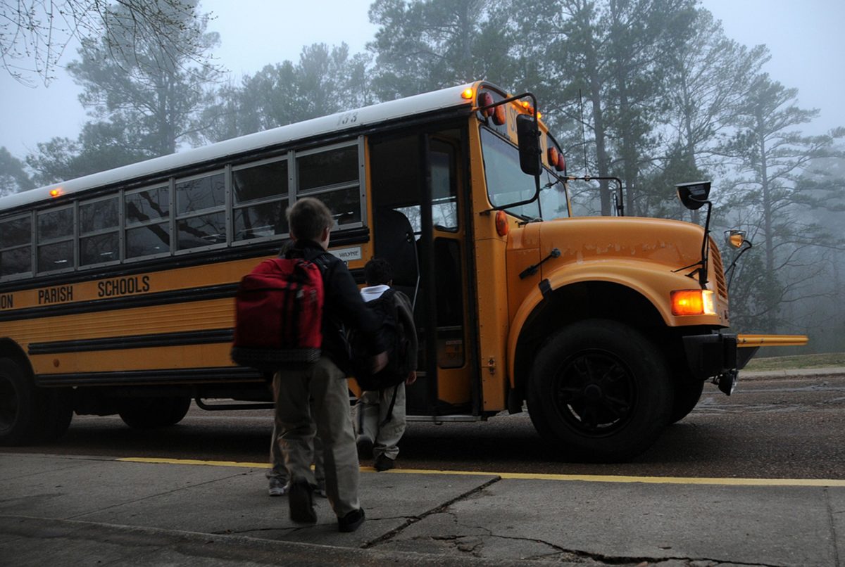 Many kids all over the world need to take the bus to get to school.