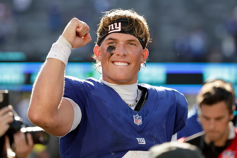 Jaxson Dart celebrates his win against the Chargers.