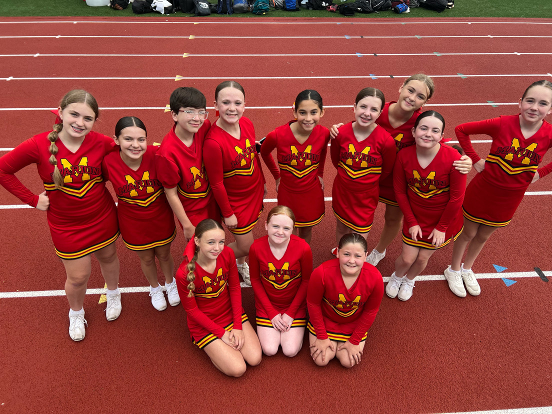 Landon Davis, ‘30, and his 8th-grade cheer team showing that anyone can do anything they put their mind to. (Courtesy of Taylor Davis)
