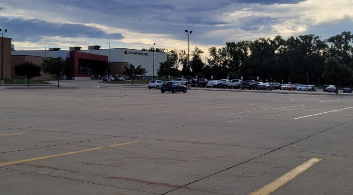 Teenagers who go to the Linn-Mar parking lot now are searching for a new place since the parking lot is now full of police. (Courtesy of Mackenzie Neal)