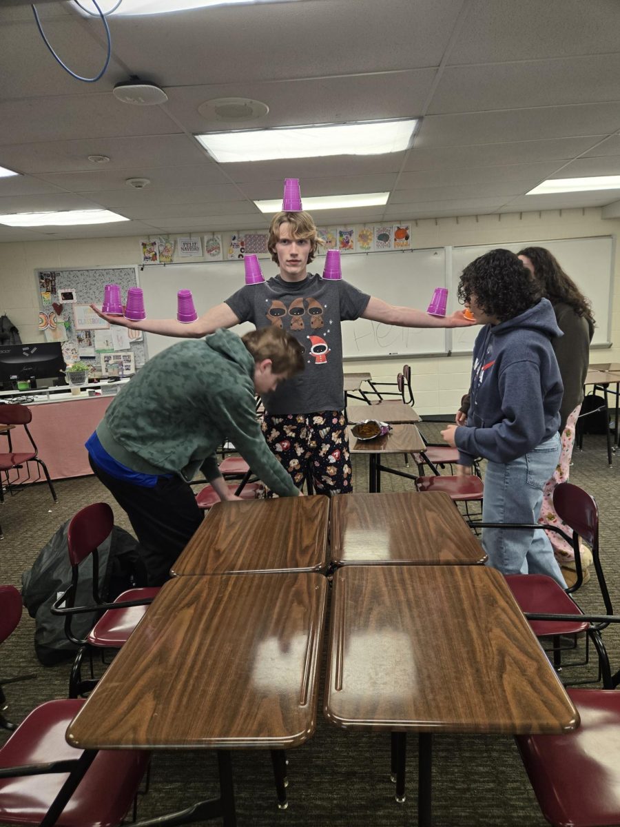 Senior Elliott Zrudsky participates in a heated competition in Hansen's math class.