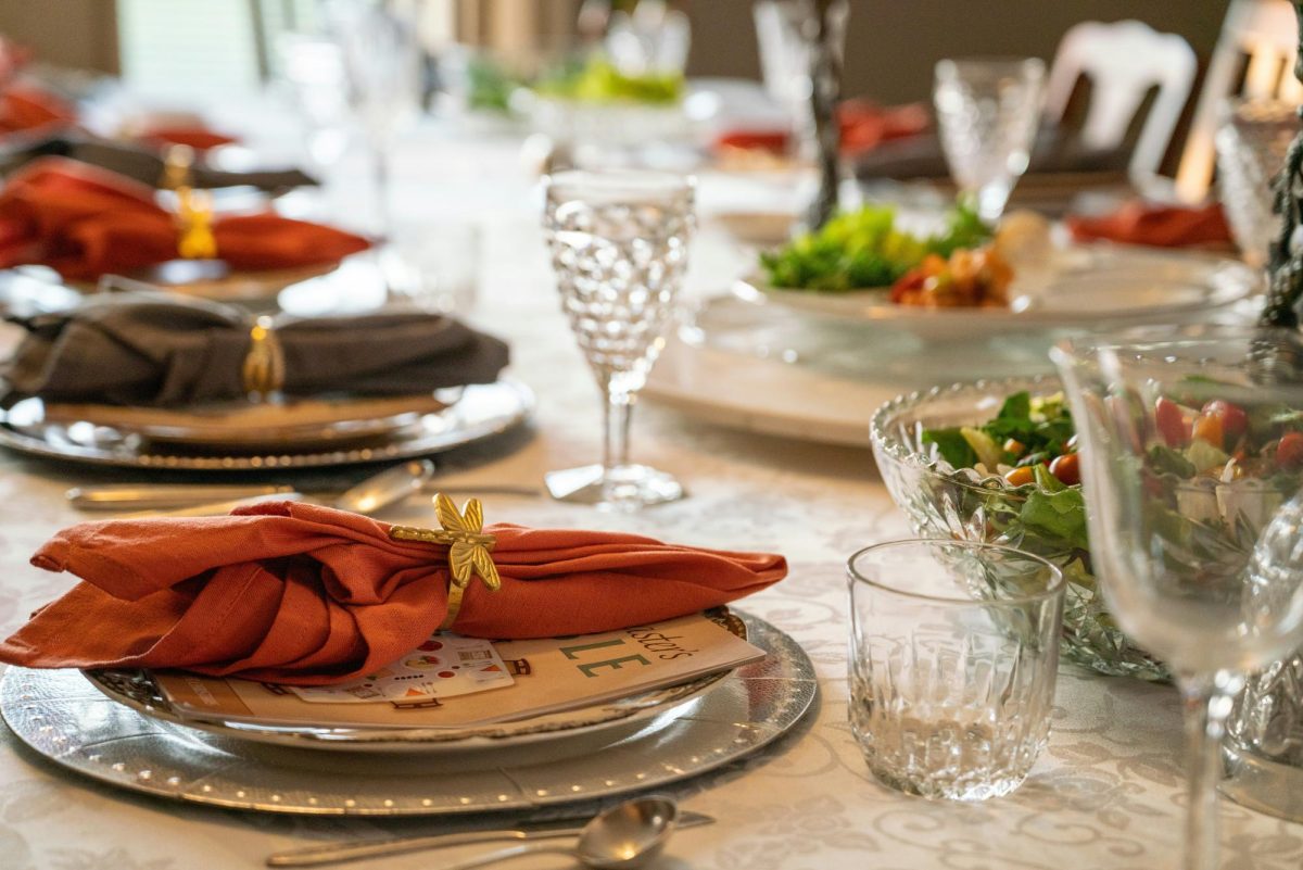The dinner table is where many families create a strong bond while sharing a meal. (Courtesy of Rosemary Williams/Unsplash)
